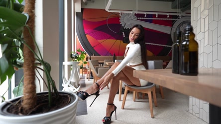 SuperMolly777/girl walk in leather skirt high heels long legs legs in oil.mp4
